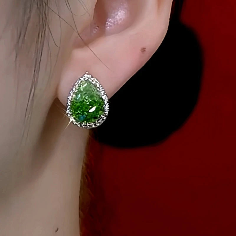 Close-up detail of the sparkling zircons and plating on the Green Crystal Earrings