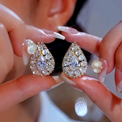 Close-up detail of the sparkling zircons and plating on the Water Drop Earrings