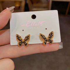 Angled view of the 14K Gold-Plated Butterfly Stud Earrings