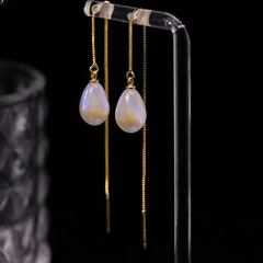 Angled view of the 14K Gold-Pated Water Drop Pearl Threader Earrings