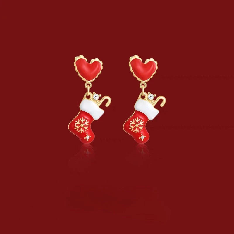 Model showcasing the dangle and style of the 14K Gold-Plated 2025 Christmas Heart-Design Tree And Socks Earrings