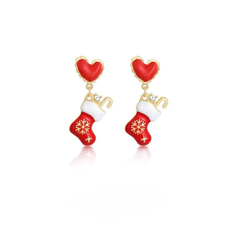 Angled view of the 14K Gold-Plated 2025 Christmas Heart-Design Tree And Socks Earrings