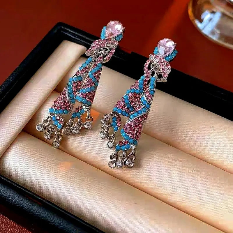 Model showcasing the dangle and style of the 14K Gold-Plated 2025 Elegant Diamond-Studded Tassel Earrings