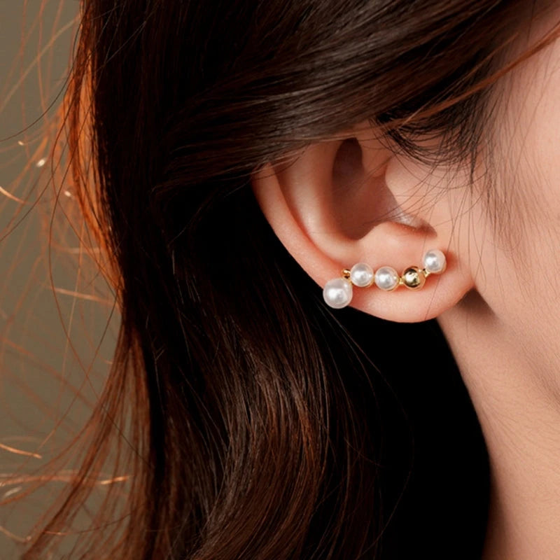 Model showcasing the dangle and style of the 14K Gold-Plated 2025 Elegant Pearl Earrings