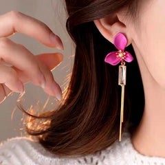 Angled view of the 14K Gold-Plated 2025 Elegant Zircon Diamond Flower Tassel Earrings