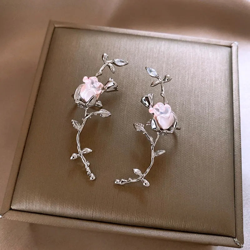 Model showcasing the dangle and style of the 14K Gold-Plated 2025 Elegant Zircon Rose Crawler Clips