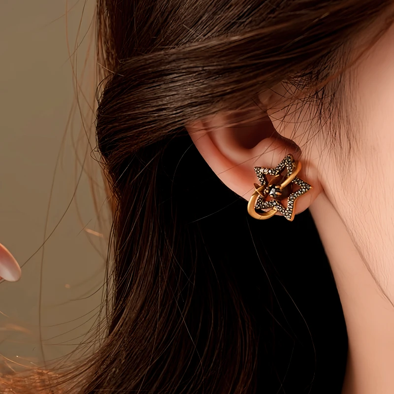 Angled view of the 14K Gold-Plated 2025 Elegant Zircon Star Stud Earrings