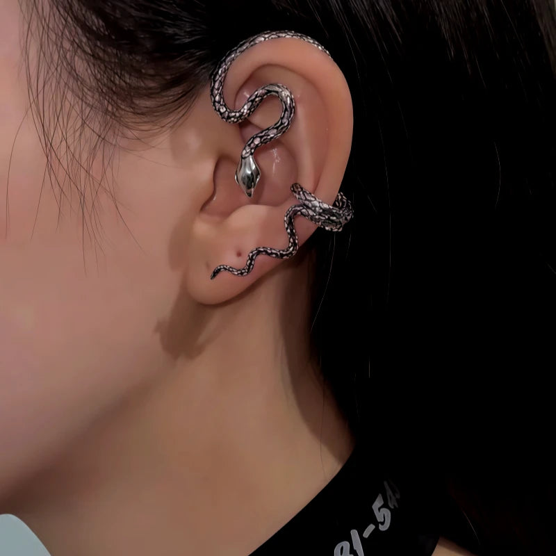 Model showcasing the dangle and style of the 14K Gold-Plated 2025 Snake Ear Cuffs ( 1 Pair  )