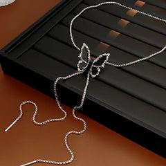 Close-up of the pendant and clasp on the silver butterfly necklace