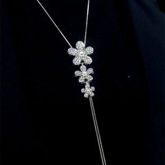 14K Gold-Plated Adjustable Flower Sweater Chain Necklace worn to showcase its length and pendant detail