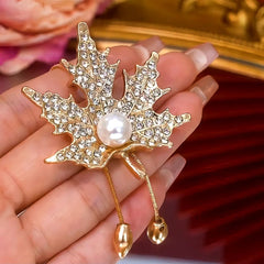 14K Gold-Plated Adjustable Maple Leaf Sweater Chain Necklace worn to showcase its length and pendant detail