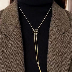 Detailed view of the 14K Gold-Plated Adjustable Rose Tassel Necklaces chain and pendant