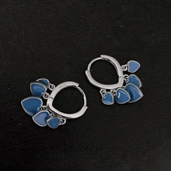 Angled view of the 14K Gold-Plated And Sterling Silver Blue Heart Tassel Earrings