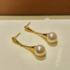 Angled view of the 14K Gold-Plated Bead Tassel Earrings