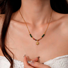 14K Gold-Plated Beaded Sun Necklace worn to showcase its length and pendant detail