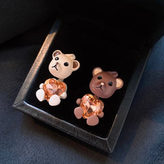 Angled view of the 14K Gold-Plated Beart In Love Heart Earrings