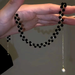 14K Gold-Plated Black Bead Necklaces worn to showcase its length and pendant detail