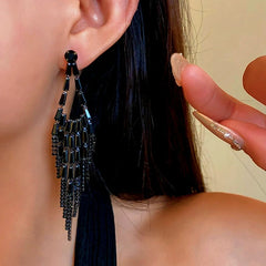 Close-up detail of the sparkling zircons and plating on the Black Tassel Earrings