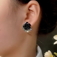 Close-up detail of the sparkling zircons and plating on the Black Rose Studs
