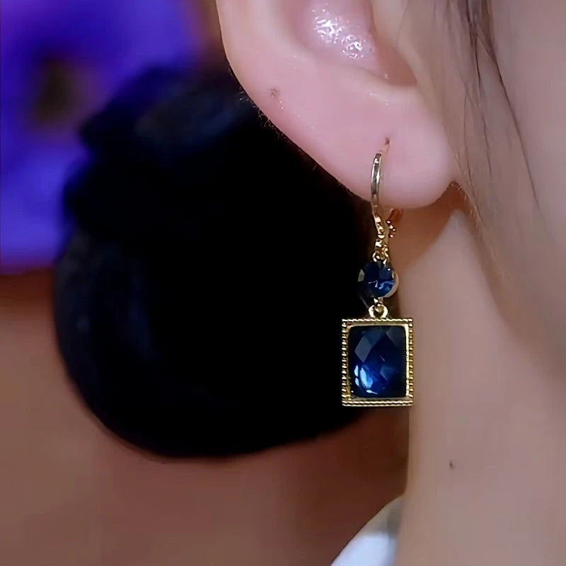 Close-up detail of the sparkling zircons and plating on the Blue Crystal Earrings