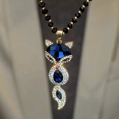 14K Gold-Plated Blue Fox Pendant Necklace worn to showcase its length and pendant detail