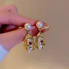 Close-up detail of the sparkling zircons and plating on the Bouquet Pearl Earrings