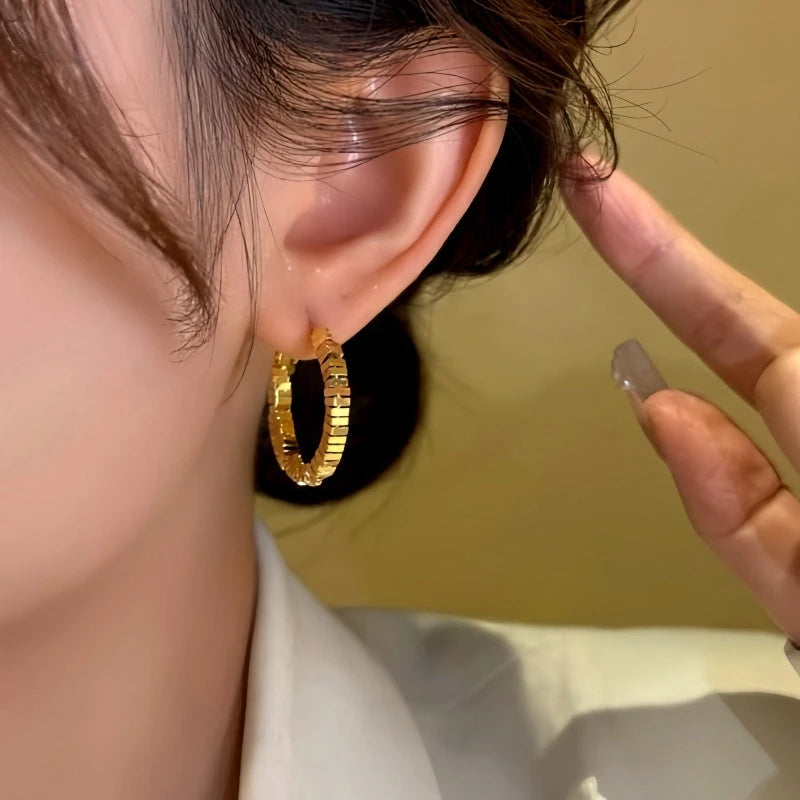 Close-up detail of the sparkling zircons and plating on the Diamond Hoop Earrings