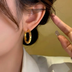 Close-up detail of the sparkling zircons and plating on the Diamond Hoop Earrings