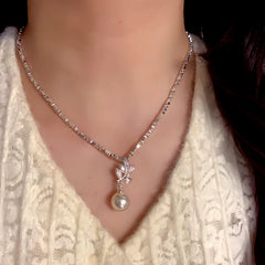 Close-up of the pendant and clasp on the Leaf Pearl Necklace