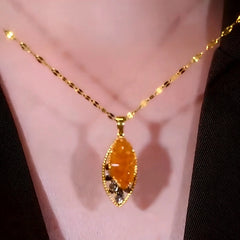 14K Gold-Plated Brown Crystal Leaf Pendant Necklace worn to showcase its length and pendant detail