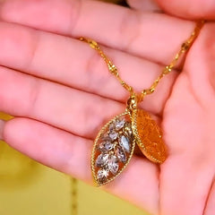 Detailed view of the 14K Gold-Plated Brown Crystal Leaf Pendant Necklace chain and pendant