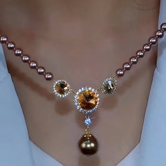 14K Gold-Plated Brown Crystal Sunflower Beaded Necklace worn to showcase its length and pendant detail