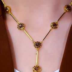 Close-up of the pendant and clasp on the Tassel Necklace