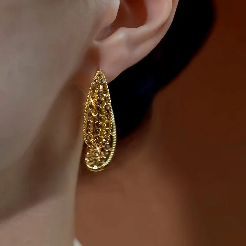 Close-up detail of the sparkling zircons and plating on the Brown Diamond Earrings