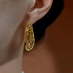 Close-up detail of the sparkling zircons and plating on the Brown Diamond Earrings