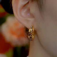 Close-up detail of the sparkling zircons and plating on the Brown Diamond Hoops