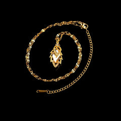 Close-up of the pendant and clasp on the Leaf Pendant Necklace