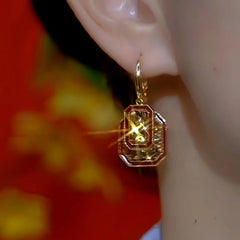 Close-up detail of the sparkling zircons and plating on the Retro Square Earrings