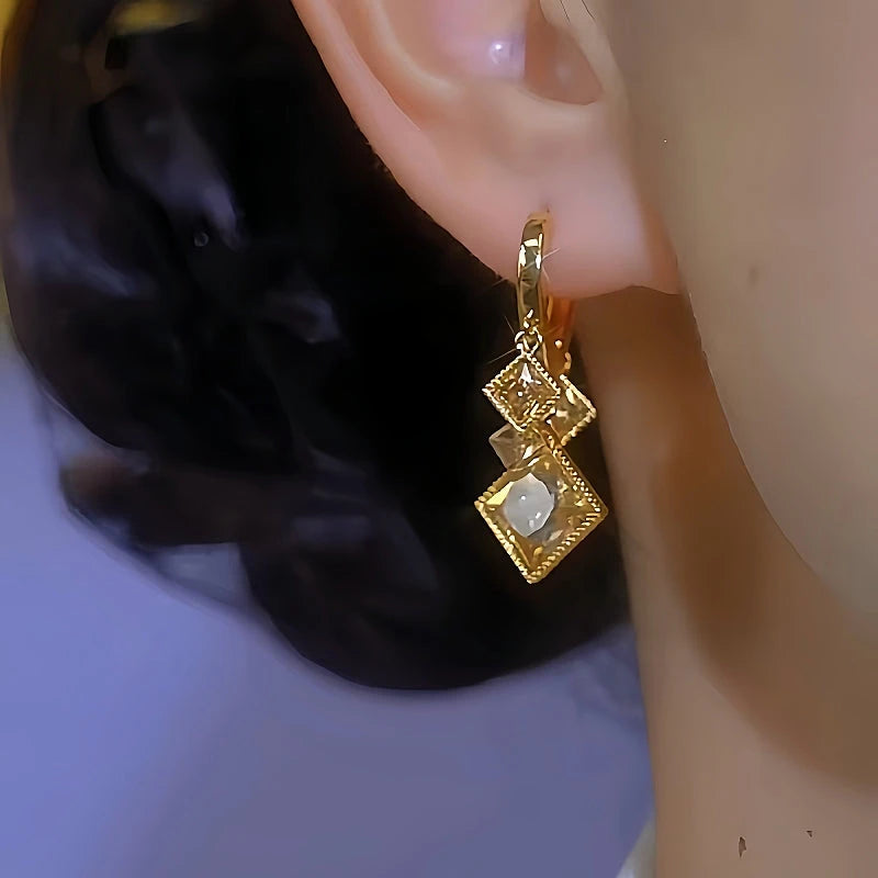 Close-up detail of the sparkling zircons and plating on the Brown Zircon Earrings