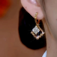 Close-up detail of the sparkling zircons and plating on the Brown Zircon Earrings