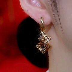 Close-up detail of the sparkling zircons and plating on the Brown Zircon Earrings