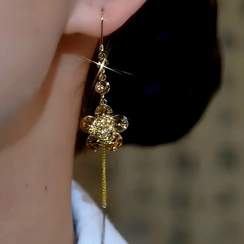 Close-up detail of the sparkling zircons and plating on the Flower Threader Earrings