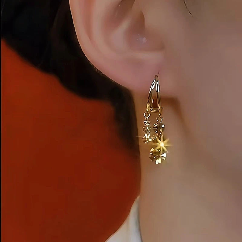 Close-up detail of the sparkling zircons and plating on the Zircon Tassel Earrings