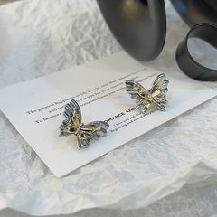 Angled view of the 14K Gold-Plated Butterfly Earrings
