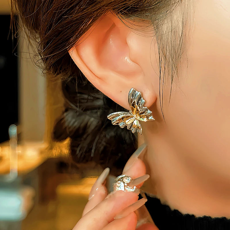 Close-up detail of the sparkling zircons and plating on the Butterfly Earrings