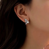 Silver Crystal Butterfly Pearl Stud Earring on Woman's Earlobe