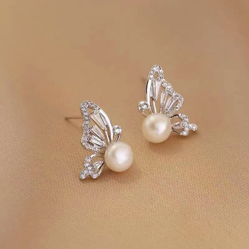 Close-up detail of the sparkling zircons and plating on the Pearl Stud Earrings