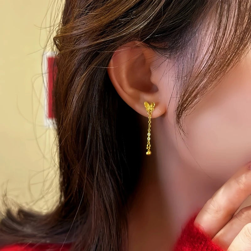 Close-up detail of the sparkling zircons and plating on the Butterfly Tassel Earrings