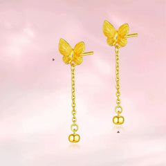 Angled view of the 14K Gold-Plated Butterfly Tassel Earrings