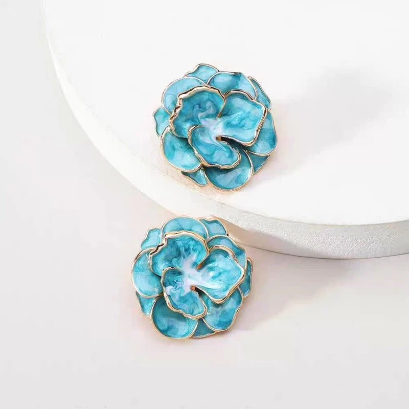 Angled view of the 14K Gold-Plated Camellia Flower Stud Earrings